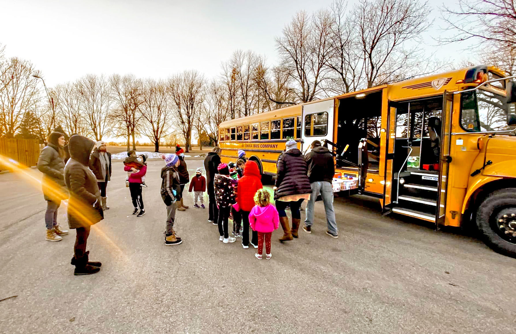 Kindness Crew loading the bus